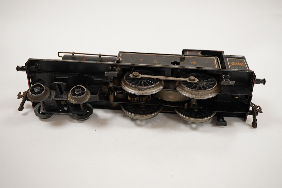 An 0 gauge Bing for Bassett-Lowke tinplate clockwork LNWR 4-4-0T locomotive, 3611, with original clockwork mechanism